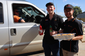 Motorist Rob gets a free breakfast from Richard and Jason.