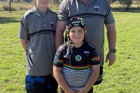 Panther of the Week, Zaiden Pracy (under eights) with coach Bryan Dixon and his son.