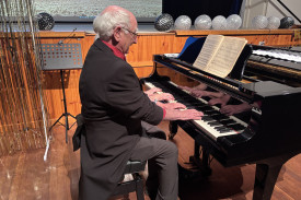 A surprising performance from an emerging pianist. Top secret: it was Patrick Giltrap, who presented to play while Janet Cheal actually play the notes!