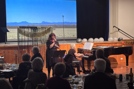 Vocal solo by Jess Reed – “Baby Grand”.