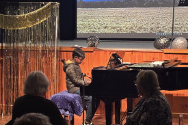 Piano solo by Janos Nithilan Rajan - a medley of movie hits.