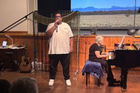 Vocal solo by Cameron Wendt - “Bridge Over Troubled Water”.