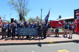 The marchers after the commemorative service in front of the Coo-ee Bronze Statue.