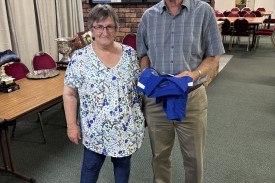 Carol Lummis presenting the Geoff and Carol Lummis 4BBB Matchplay award to Stan Doyle, and Todd Meyers (absent).