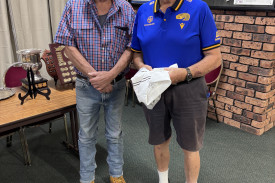 Peter Lummis presents Veterans Co-Champion Andy Harris with his prize. Co-champion Graeme Holland was absent.