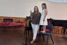 Bianca and Freyer Williams performing ‘Away in a Manger’.