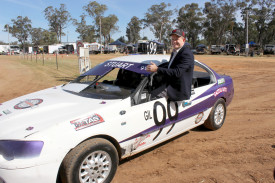 NSW Upper House MLC Stephen Lawrence, was treated to a few hot laps around the new Gilgandra Speedway track by local Street Stocker driver Geoff Stuart.