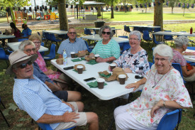 Ed Wlodarczyk, Ally and Barb Prout, Frank and Ronda Zell, Edie Wlodarczyk, and Margo Piggott enjoying the Australia Day breakfast in Hunter Park.
