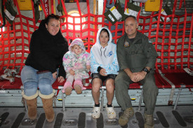 Peita Deighton, Lily Hayden, and Malakai Wakefield checking out the ‘comfort’ off the Hercules crew seats with flight sergeant James Lambeth.