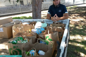 Bill Walsh with donated food items. Photo supplied.