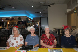 Brenda Walker, Margaret Robins, Nancy Semmler, and Bev Lewis enjoying their Melbourne Cup luncheon at the Gilgandra Services Club.