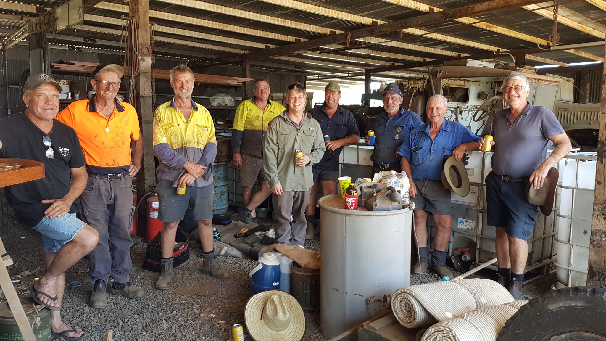 Chris and Geoff Cheal, and Ally Prout (right) with Tracy Vadnjal and members of the Newcastle Military Vehicles Club.