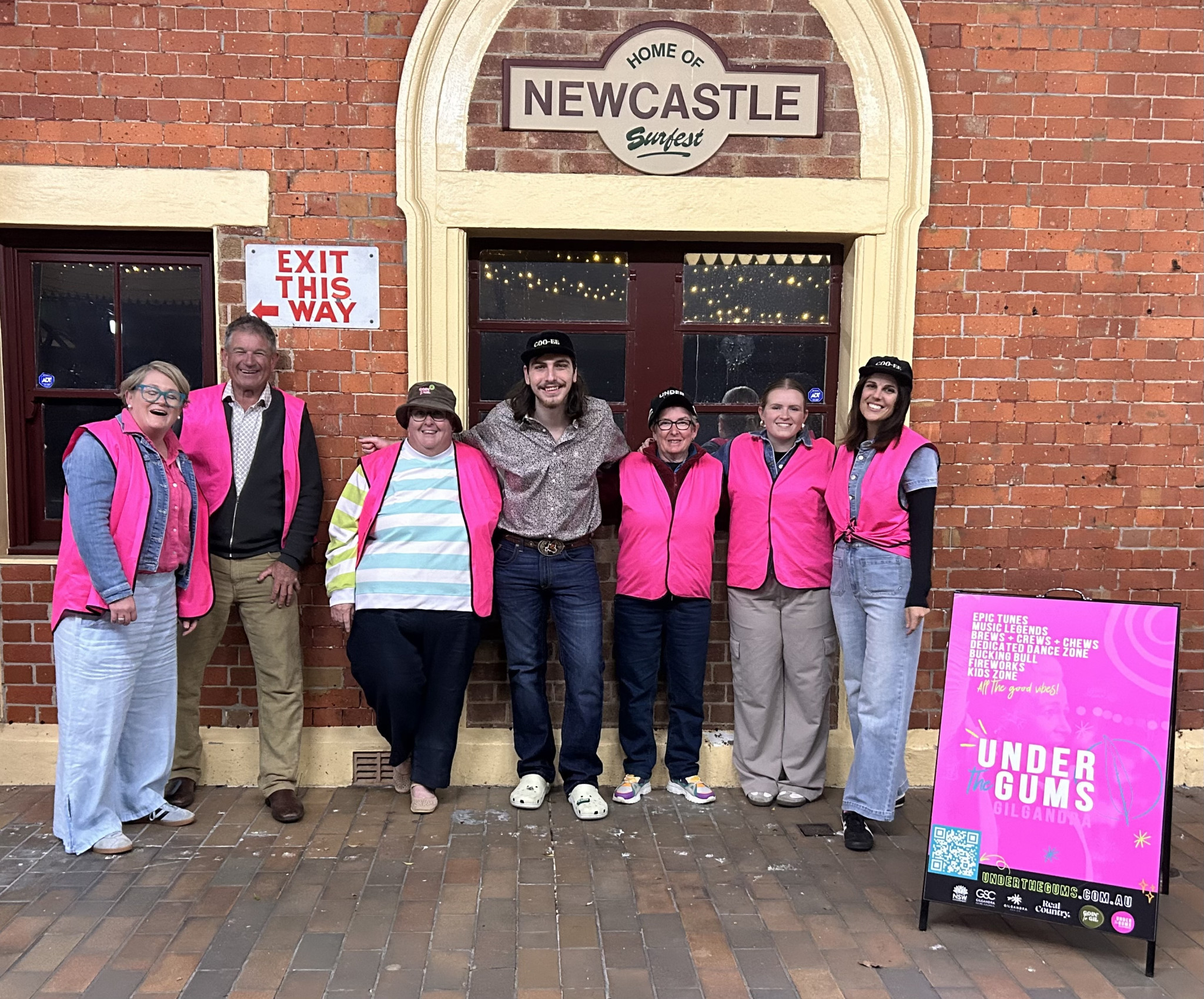 2025 Under the Gums headliner, Lane Pittman (centre), with the crew after his live performance at The Station in Newcastle.