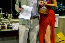 Flamin’ Galahs coach Zac Mills presenting the team’s Best and Fairest Award to Paige Wilson.