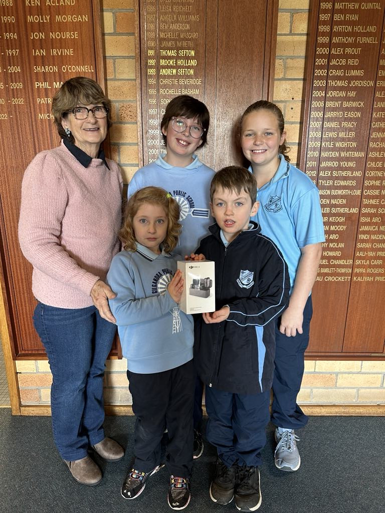 Mrs Prout with Gilgandra Public School students Dorothy, Elizabeth, Flynn, and Adelaide.