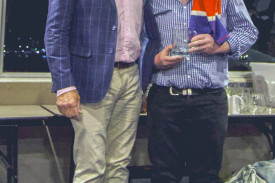 Coach Angus Beveridge with first grade’s Most Improved Award recipient Steve Owens.