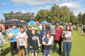 Winners of the first raffle drawn at the Hunter Park barbecue lunch. Prizes were varied, from camping equipment to kitchen appliances.