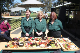 Staff of Caffeinity Coffee and Wine Company with their beautiful grazing table.