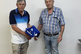 C grade champion, China Plate winner and Veterans champion, Mark Barwick, presented by Mr Lummis.
