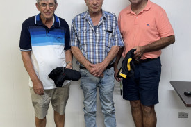 Putting champs, Mark Barwick (left), and Russell Anderson (right), Mr Lummis (centre).