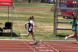 Piper Van den Ende (left) about to cross the finish line in an event at the regional championships at Dubbo.