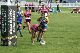 The Pink Panthers won their league tag match against the Coonabarabran Unicorns, 58-nil at McGrane Oval on Saturday, June 1, 2024. Right: Mab Fuller scores a try for the Pinkies. Photos courtesy of Stephen Basham.