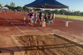 Heidi Colwell leaps through the air at the regional championships at Dubbo.