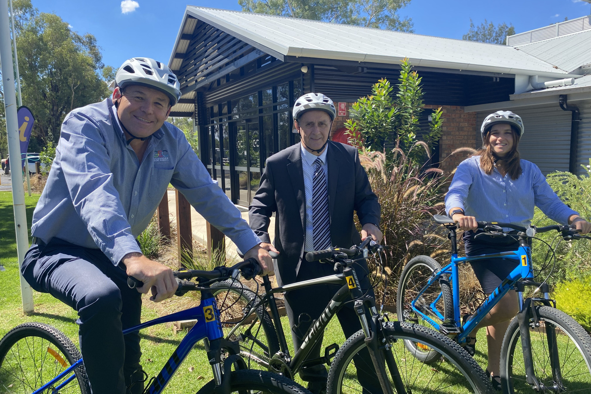 Gilgandra Shire Council’s general manager David Neeves, mayor Doug Batten, and Acting activation and communication manager, Merscia Kouroulis are excited about the new bike hire service being launched at the CHC this weekend. Photo supplied.