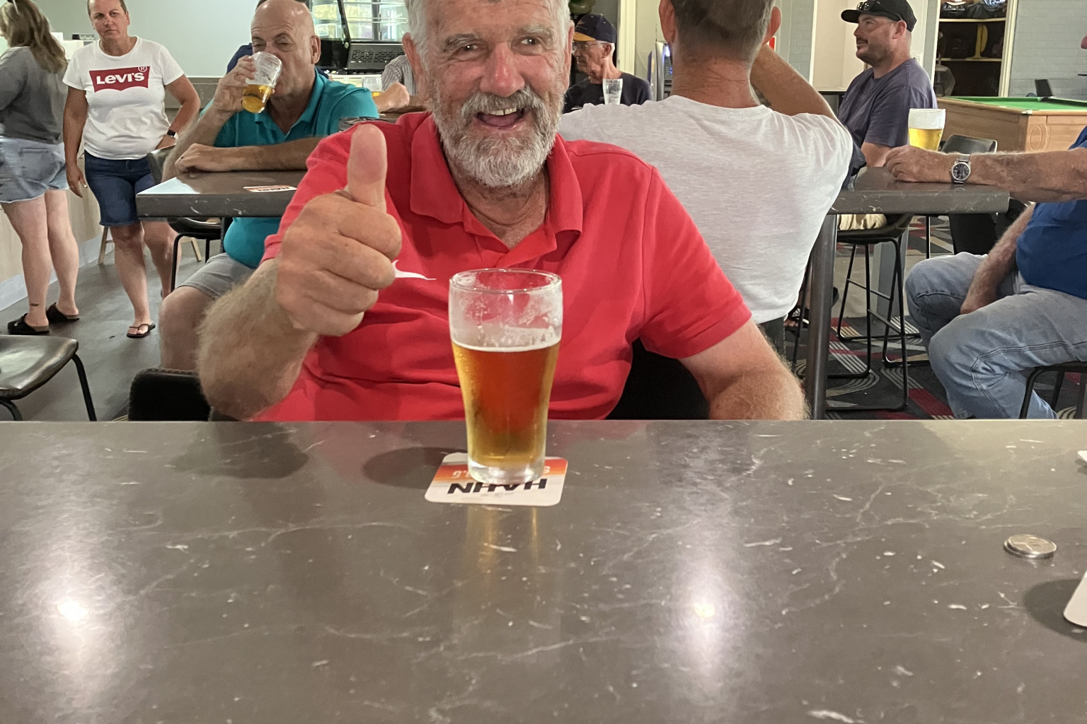 Mick Hannelly enjoying a cold drink after a day of bowls named in his honour, the Farewell Mick Hannelly bowls day. Photo courtesy Maxine Elsom.