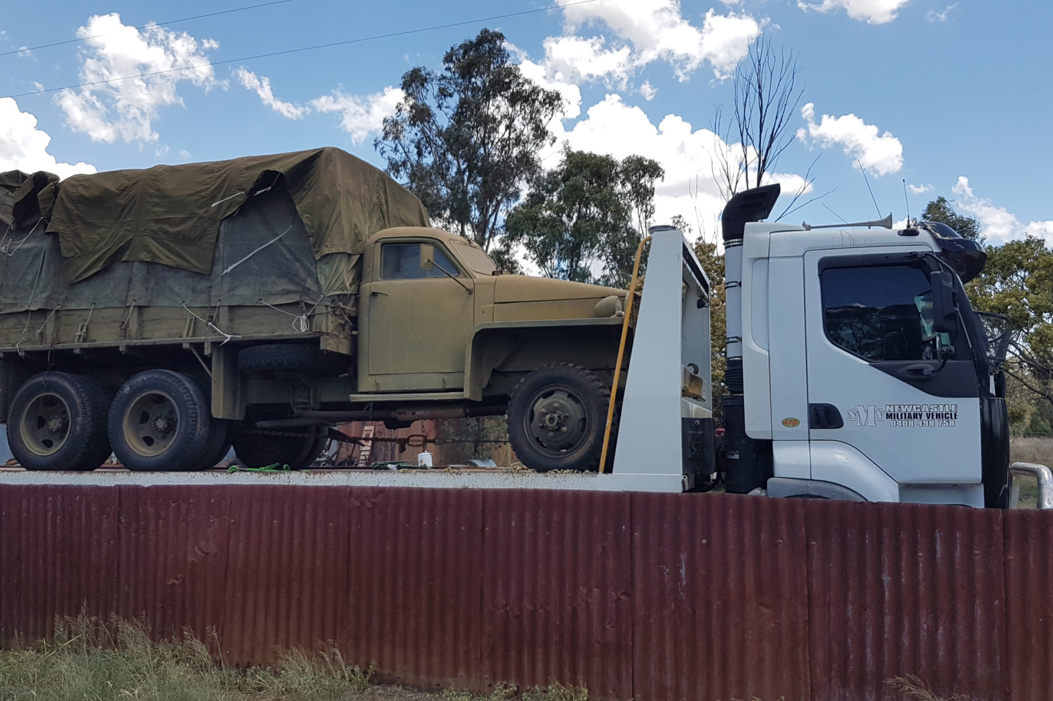 The “good old Studebaker” that accompanied the Coo-ee and Kookaburra marches, being loaded for transport to its new home. Photos contributed.