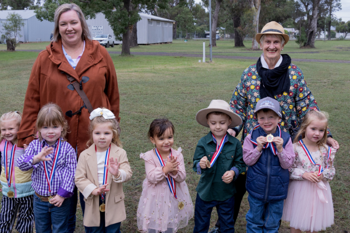 Melanie Moeris and Helen Oates with this year’s Tiny Tots entrants. Photo by The Gilgandra Weekly: Nicholas Croker.