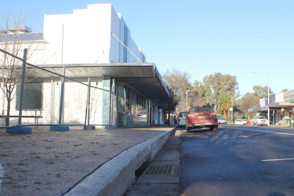 The footpath and kerb out front of Miller Street’s new GIL Library Hub has been causing concerns among locals due to its raised height compared to the rest of the street. Pho