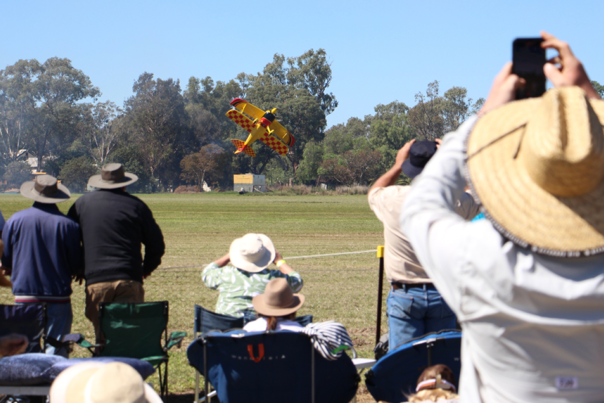 Pilot Paul Bennet enacting his signature ‘photo shot’ above the runway as part the 2025 Tooraweenah Airshow on Saturday, April 5. Photo by The Gilgandra Weekly: Lucie Peart.