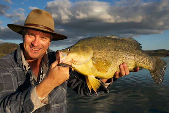 Jim Harnwell, DPI Recreational and Indigenous Fishing Unit officer, with a golden perch caught at Lake Windamere. Photo DPI.
