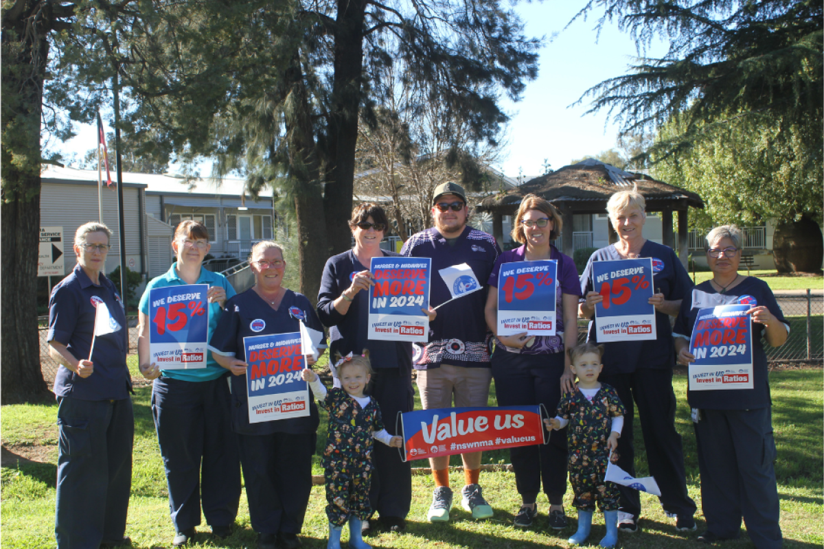 NSWNMA members Sheree Staggs, Pam Martin, Tracey Allport, Dinah Riley, Alexi Scotti and his children Lyla and Scarlett Scotti, Sarah Cruickshank, Susan Gregory, and Anna Hare at yesterday’s strike outside the Gilgandra hospital. Photo by The Gilgandra Weekly: Nicholas Croker.