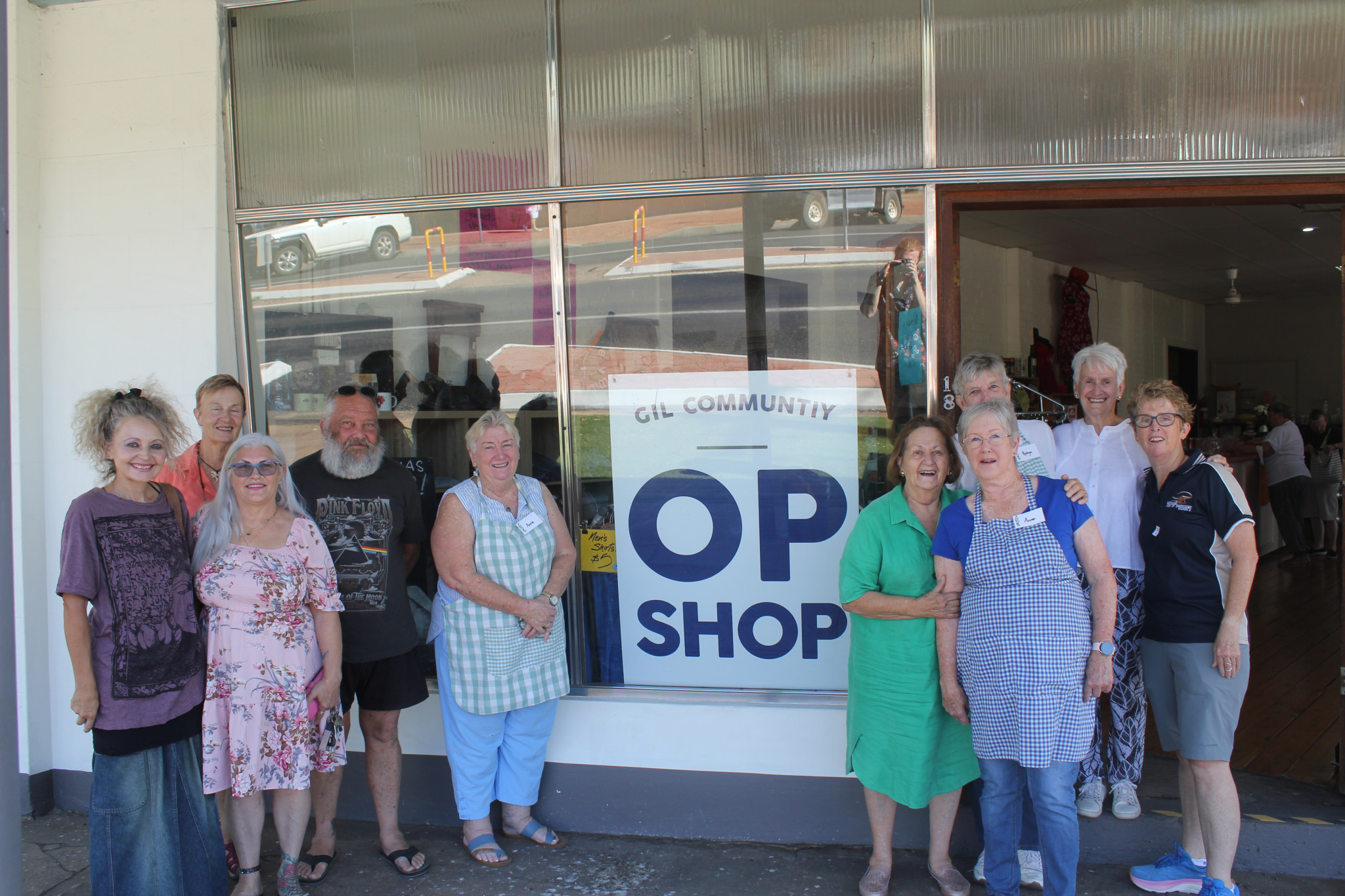 Megan White, Josie Dawson, Kathryn Rogan, Dan Rogan, Anne Armstrong, Sandy McGrath, Anne Hall, Robyn Cook, Helen Oates, and Kim Hiscox at the re-opening of the Community Op Shop on Monday, February 12. Photo by The Gilgandra Weekly: Nicholas Croker.
