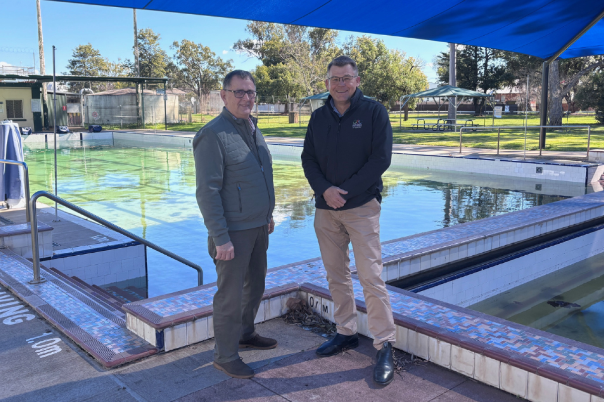Gilgandra Shire Council’s mayor Doug Batten and David Neeves are celebrating the news of a $14 million grant to fund a new sport and recreation facility including a new town pool. Photo by The Gilgandra Weekly: Lucie Peart.