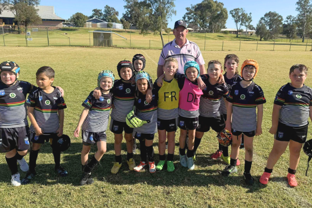 Under eights rugby league team with coach Bryan Dixon.