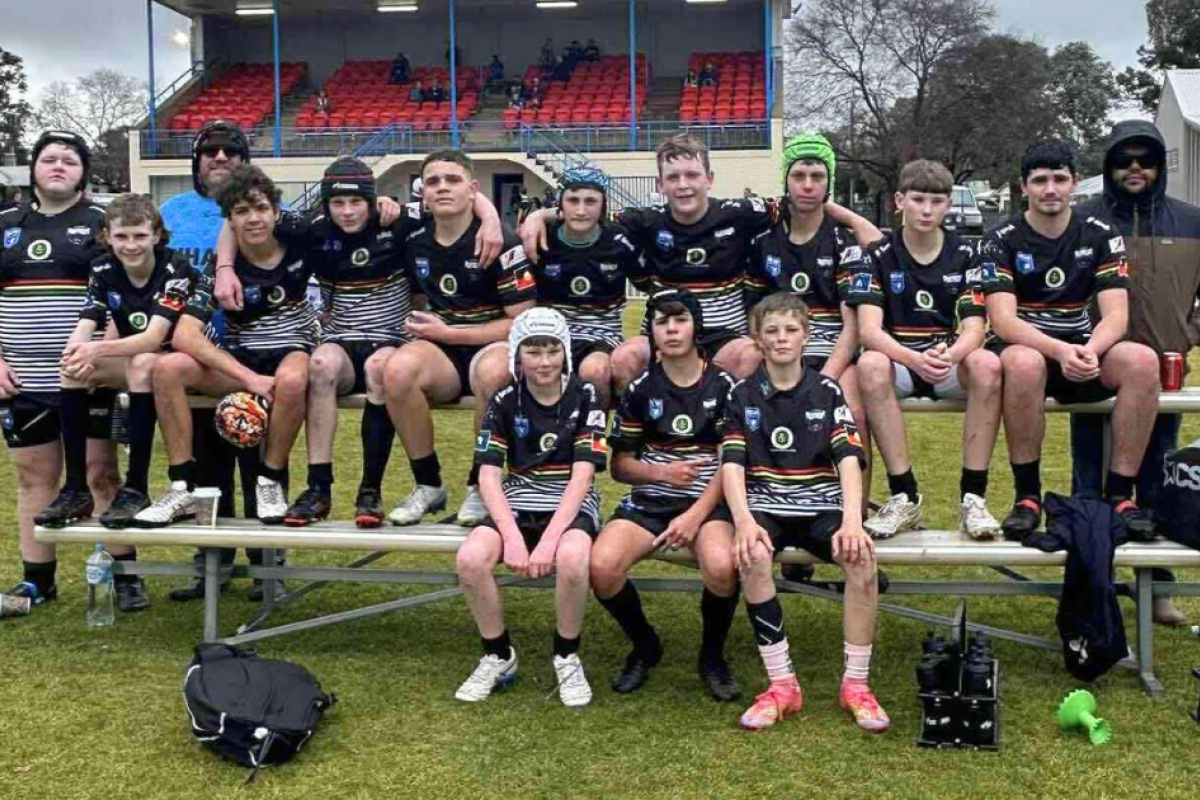 Under 14s rugby league Panthers with coach Graham Bugmy and League First Aider Shane Byrne. Photos by Gilgandra Junior Rugby League and Netball.