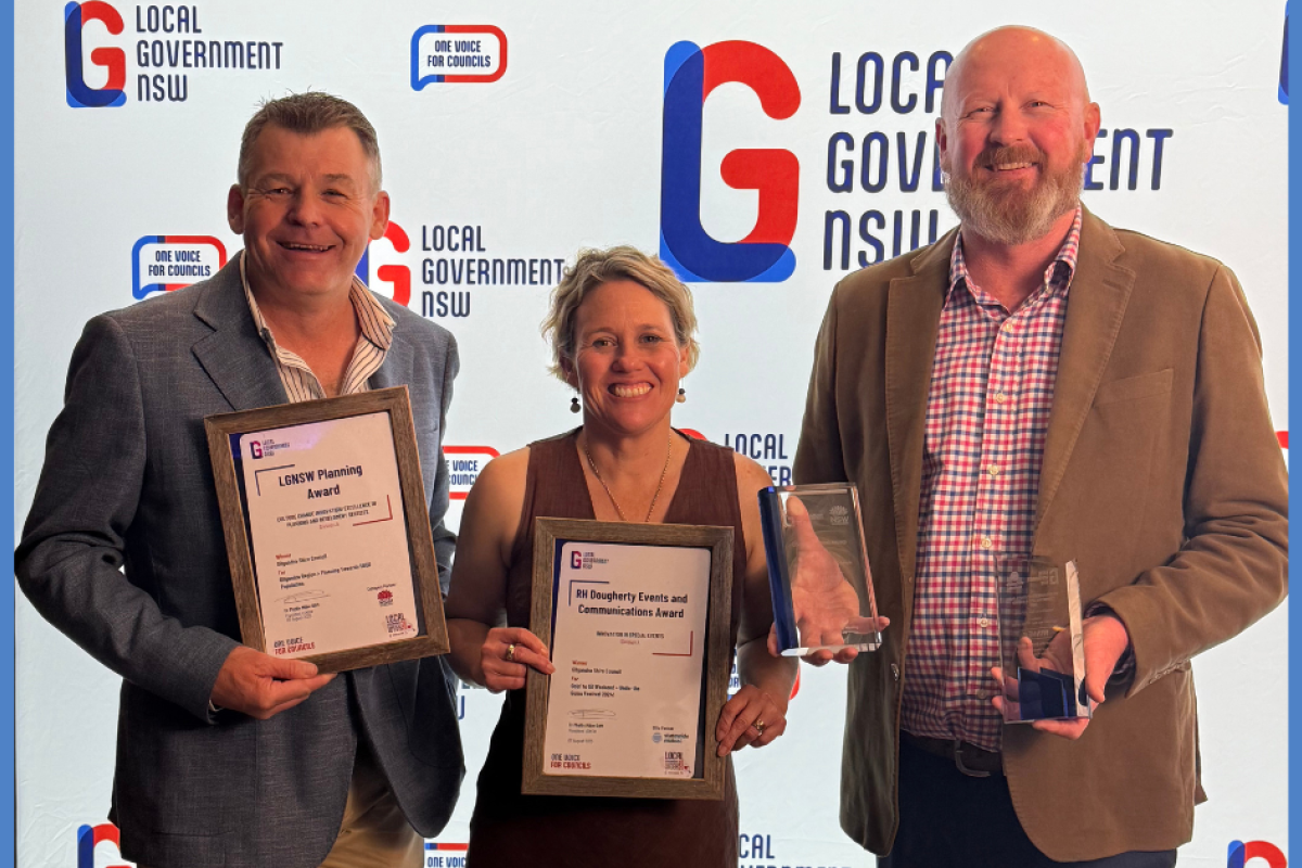 Gilgandra Shire Council’s general manager David Neeves, planning and development manager Kristy Cosier, and deputy mayor Ashley Walker accepting the two accolades at the 2025 Local Government Awards in Sydney last week. Photo supplied by Gilgandra Shire Council.