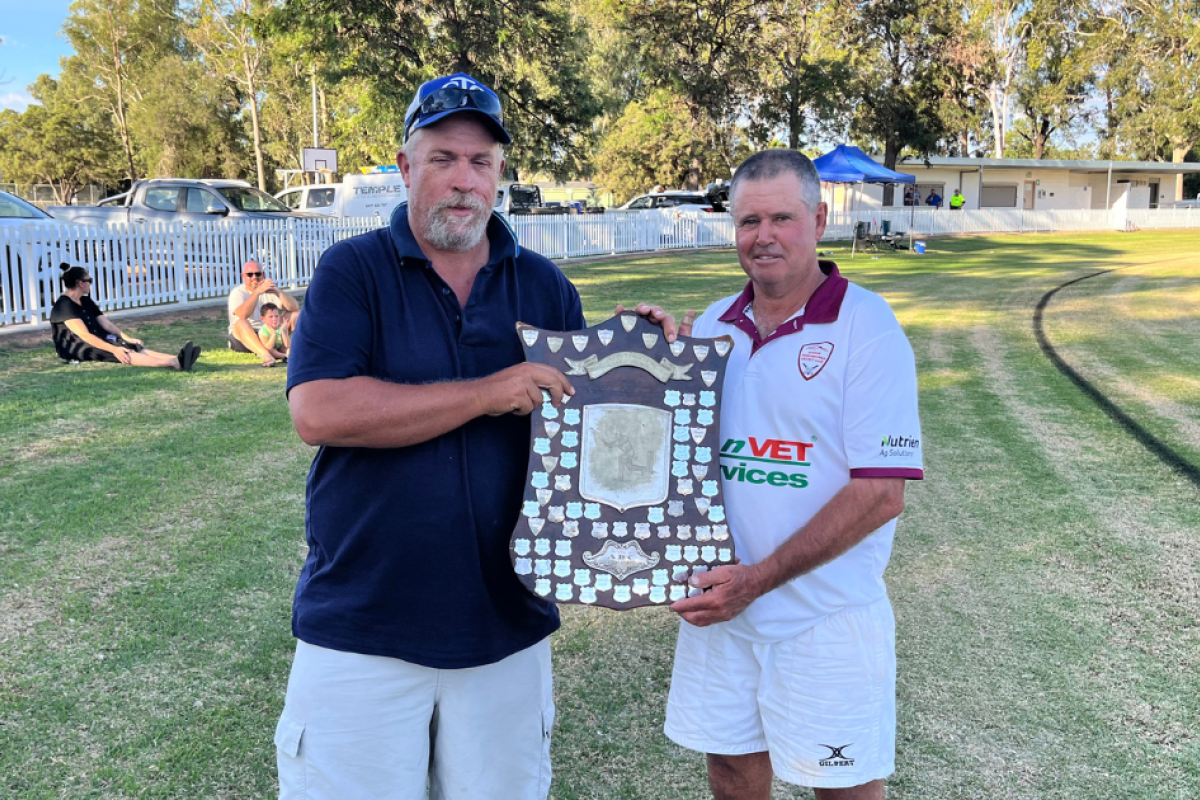 Michael George presented the Bendigo Bank ABC Shield to Biddon-Tooraweenah captain Jaimie Zell. Photos by Gilgandra District Cricket Association.