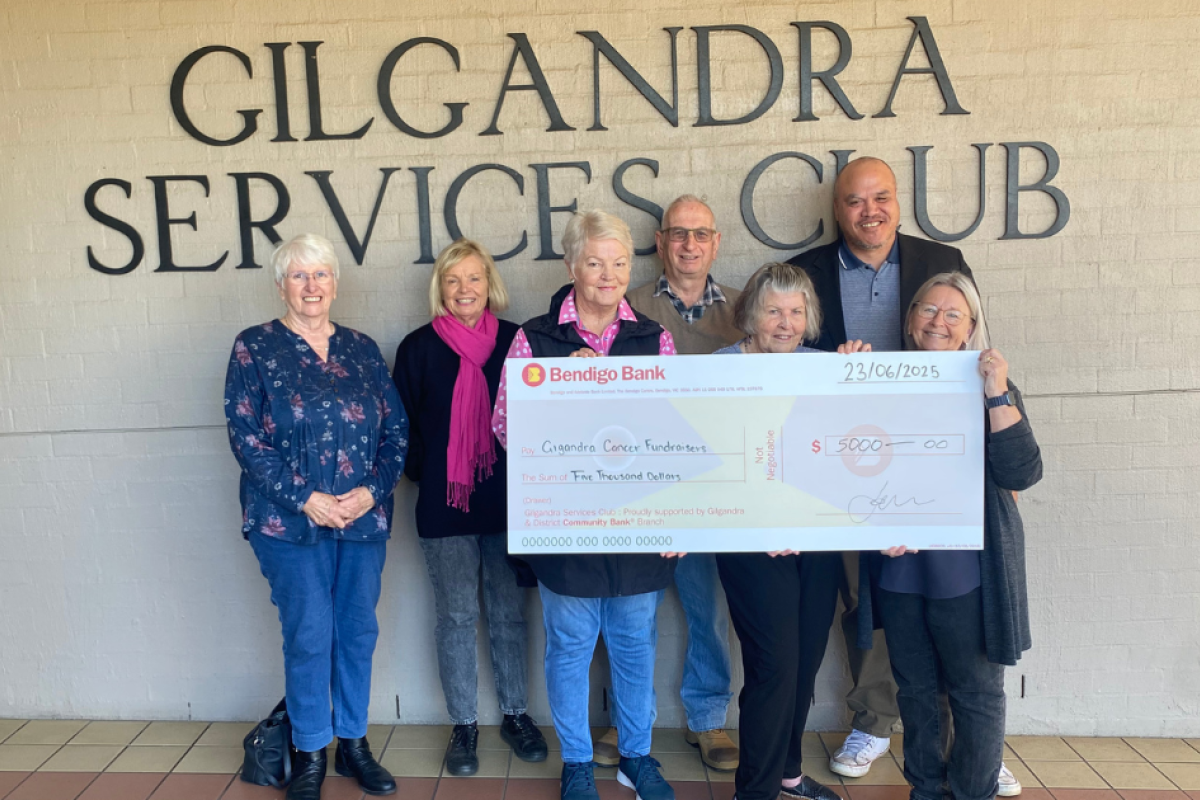 Gilgandra and District Cancer Fundraisers members with Gilgandra Services Club manager Quentin Karaitiana. Photo contributed.