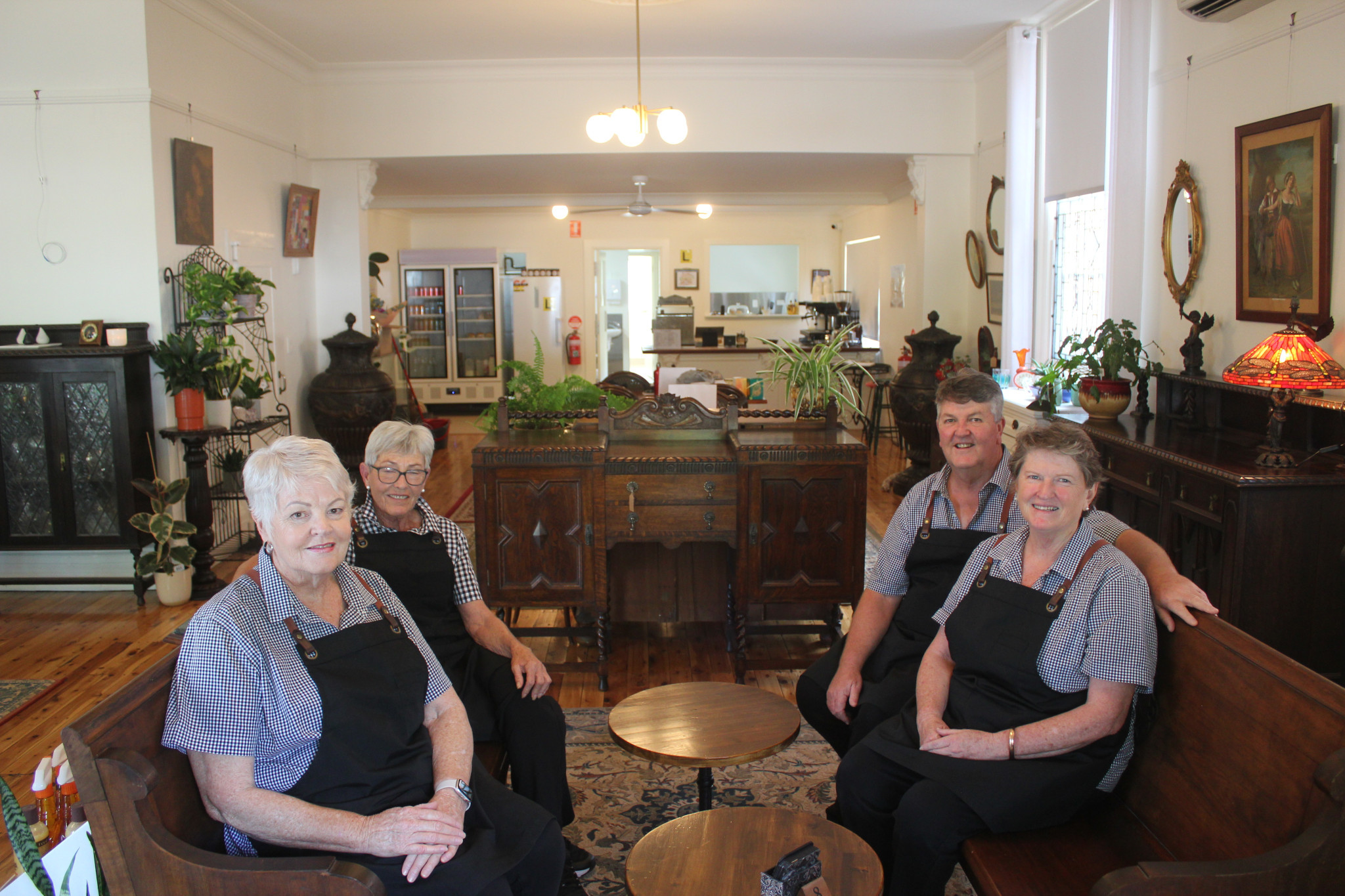 Wendy Nelson and Jane Cruickshank with proud owners of The Old Bank, Doug and Liz White. The new cafe opened to the public last week. Photo by The Gilgandra Weekly: Nicholas Croker.