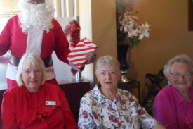 santa-bearing-gifts-with-marj-beaton—shirley-irvin—-shirley-mudford.jpg