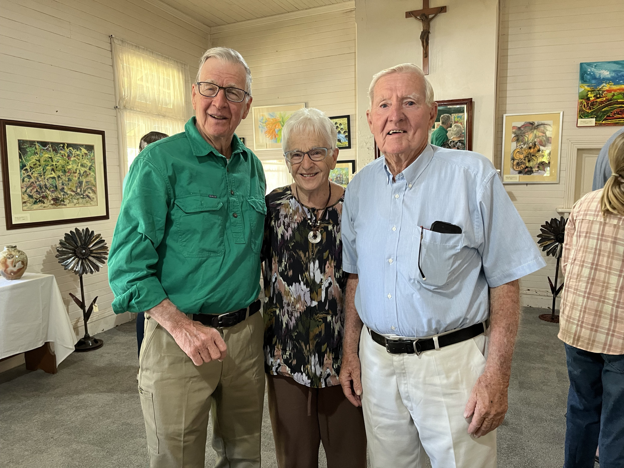 An Art Show and Sale was held over the October long weekend to help raise funds for the St Ambrose Church Restoration. Pictured are artist Geoff Thomas with Robyn and Ian Duncan. Photo supplied.