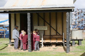 St Joseph’s pupils entering the old Uargon school during their visit to the Gilgandra Musuem.