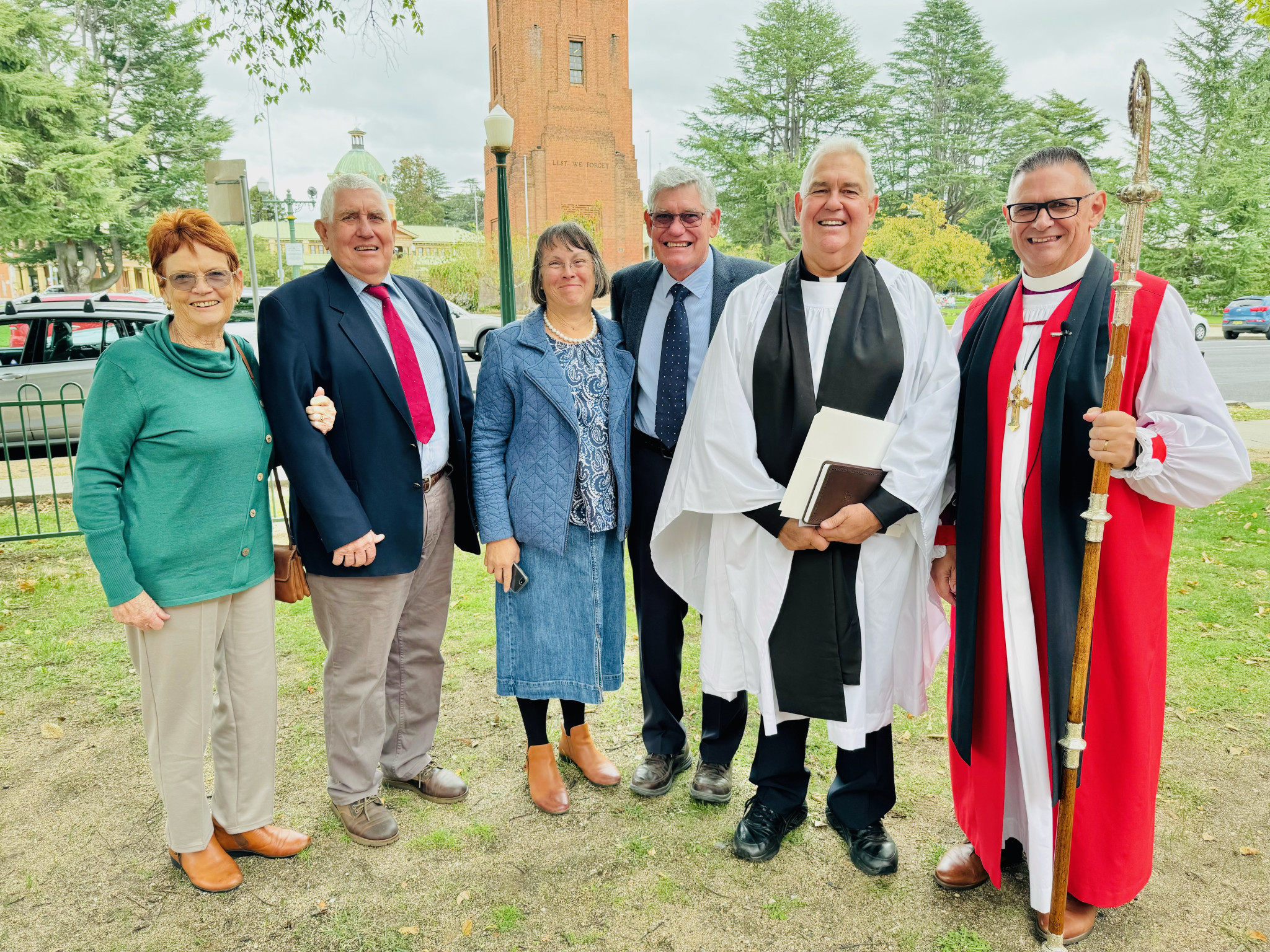 Pauline, Graham, Lyn, Bryan, and Stuart Border and bishop Calder. Photos contributed.