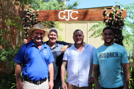 Jockey club committee members Andrew Schier and Stuart Border with Kyle Copelin and Nathan Petua.